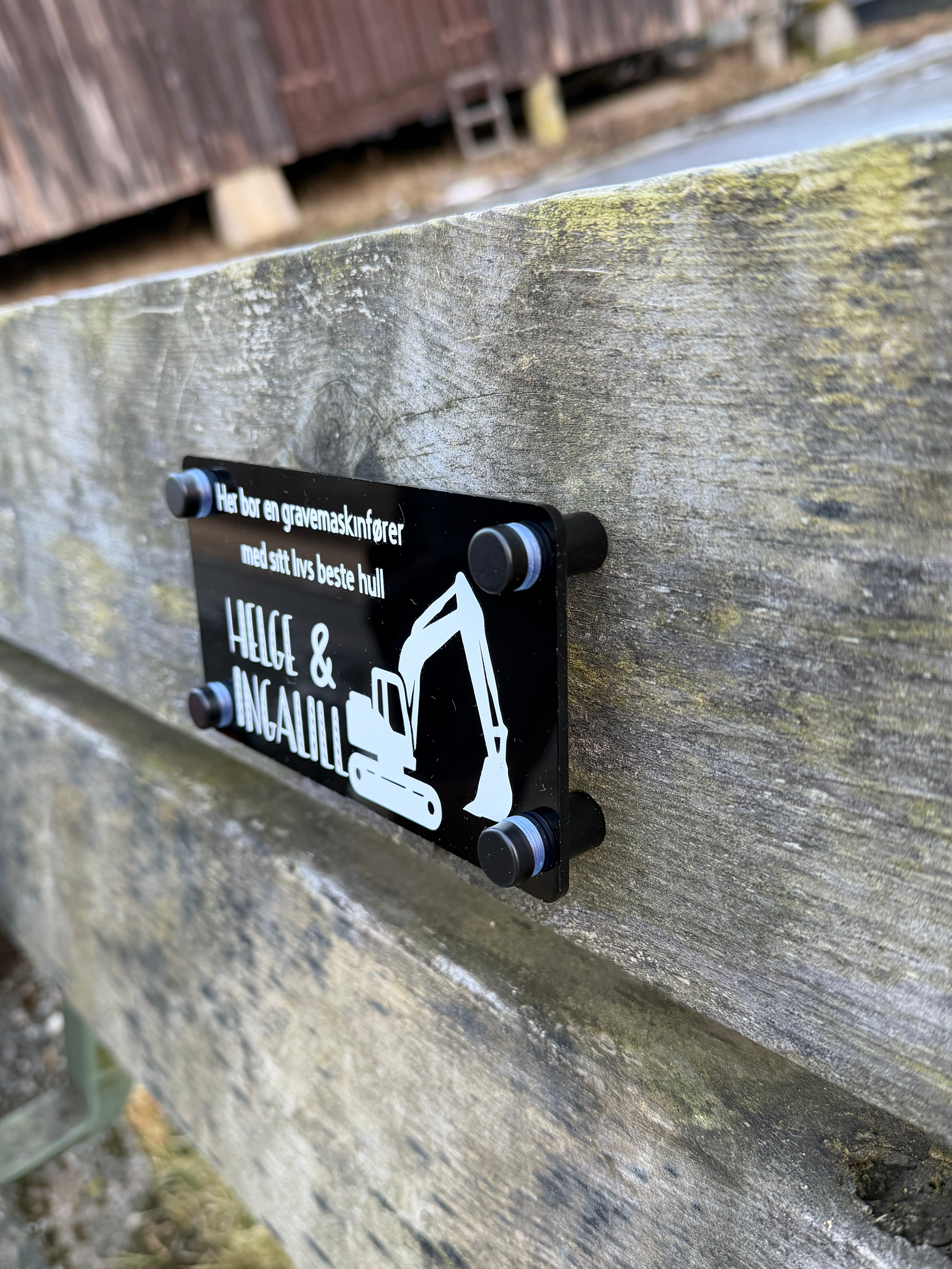 Dørskilt - gravemaskinfører